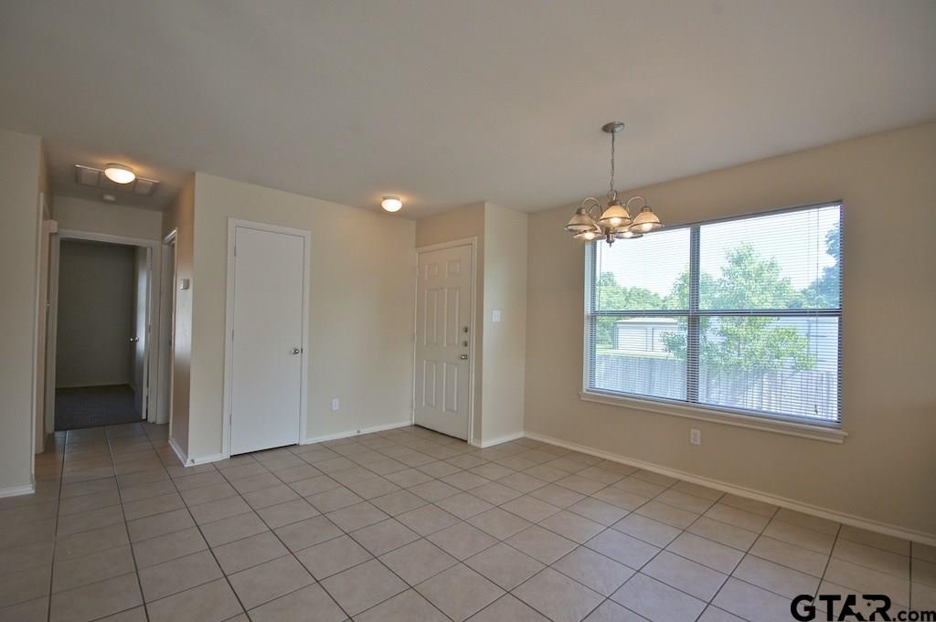 609 Hagan Road Whitehouse, TX 75791 - Photo 6 of 28 a view of an empty room with a window