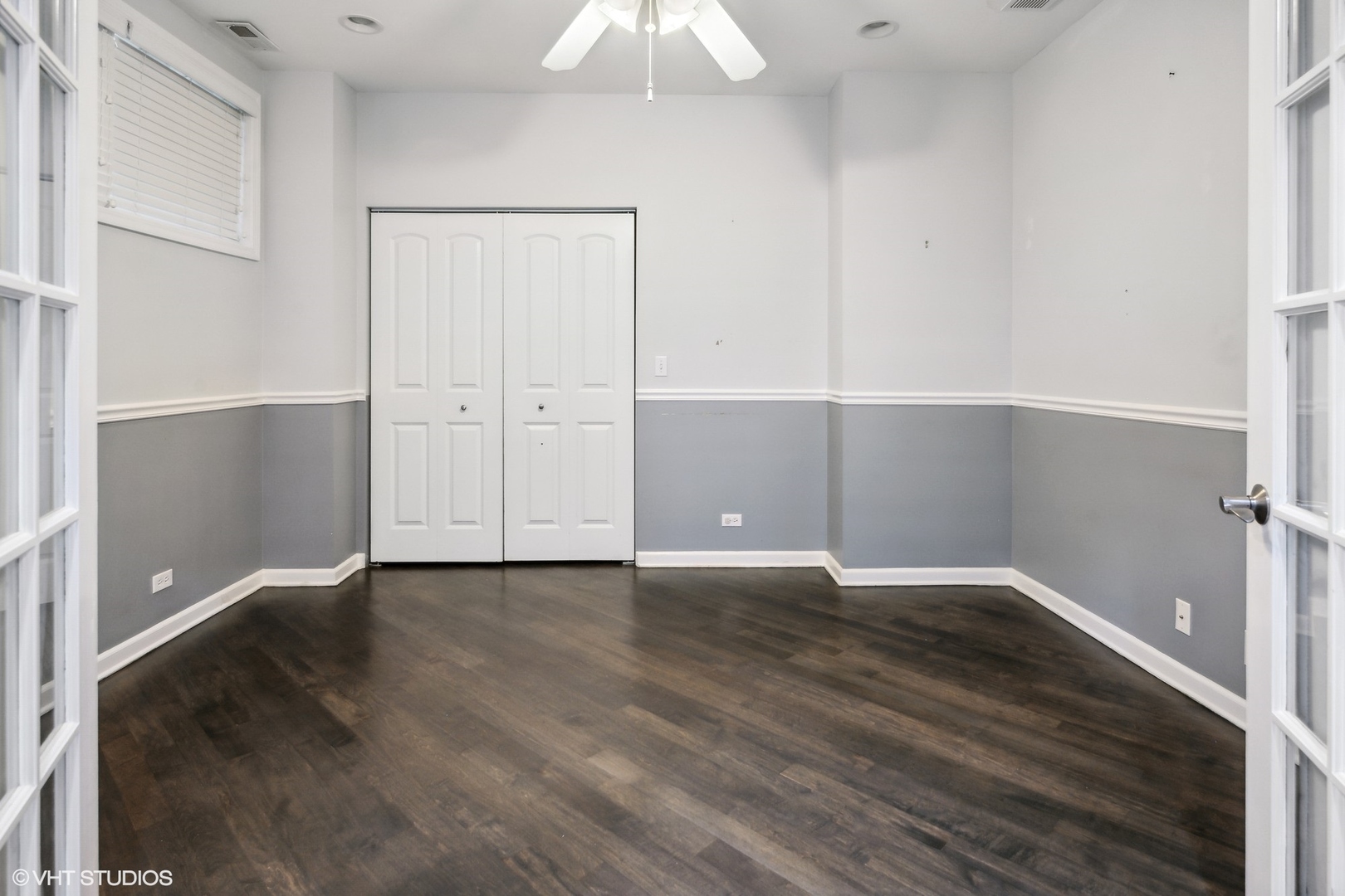 3404 North Seminary Avenue, Unit 1 Chicago, IL 60657 - Photo 11 of 15 an empty room with wooden floor and cabinet