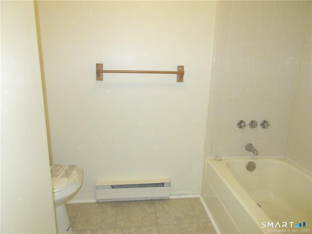 5 Nabby Road, Unit A17 Danbury, CT 06811 - Photo 8 of 11 a bathroom with a bathtub