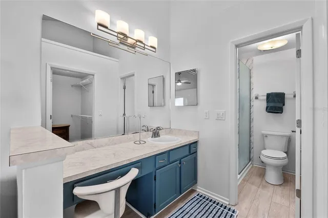 a front view of a house with a yard and a garage