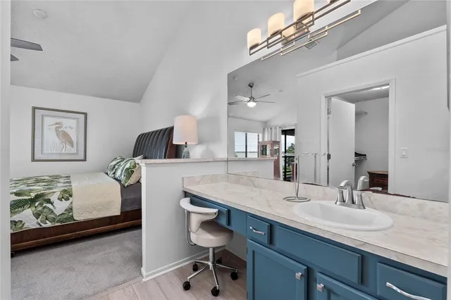 a front view of a house with a yard and tree s