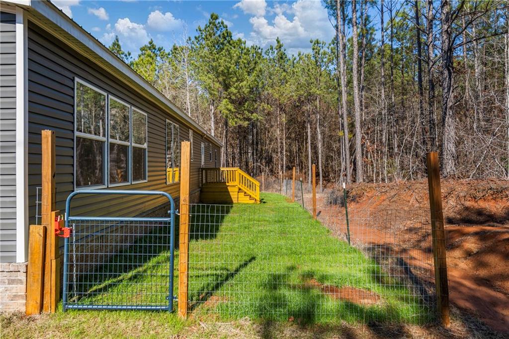 15 Rutledge Road Seale, AL 36875 - Photo 3 of 25 View of yard with a gate