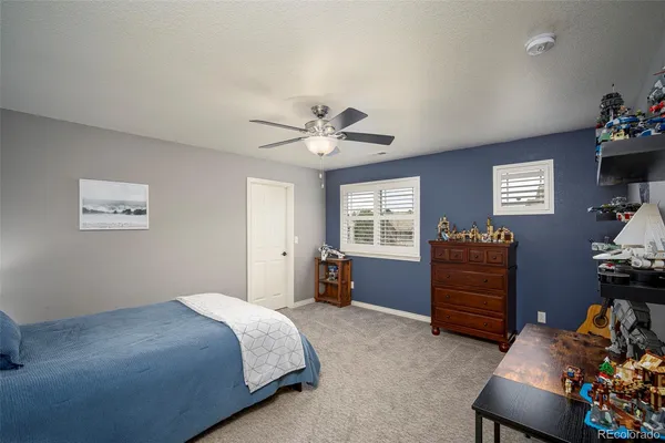 a bedroom with a bed and furniture
