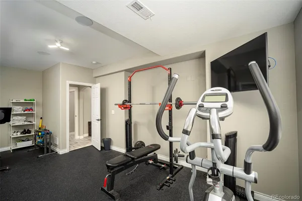 a view of a room with gym equipment