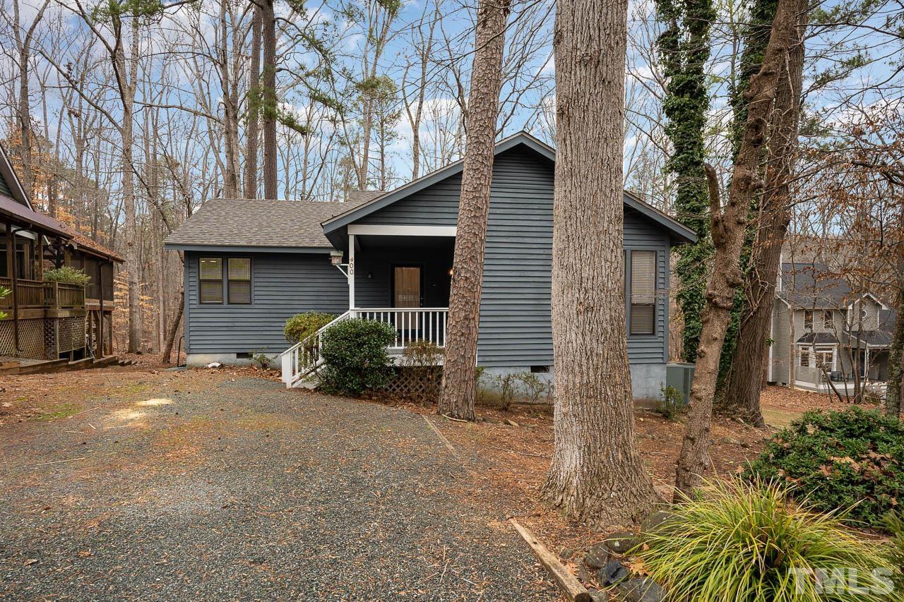 400 Waterside Drive Carrboro, NC 27510 - Photo 1 of 33 a front view of a house with garden