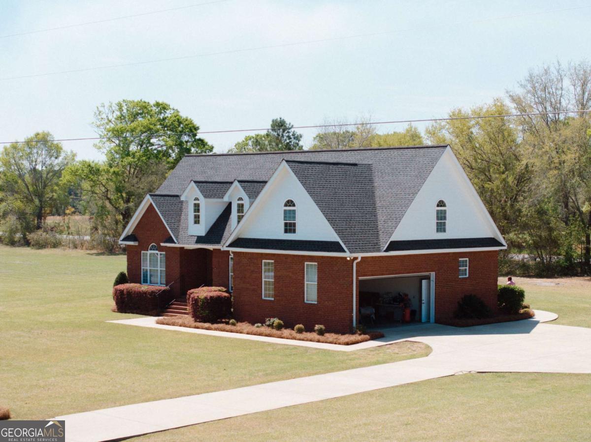 83 Gabriel Lane Baxley, GA 31513 - Photo 1 of 25 an aerial view of a house