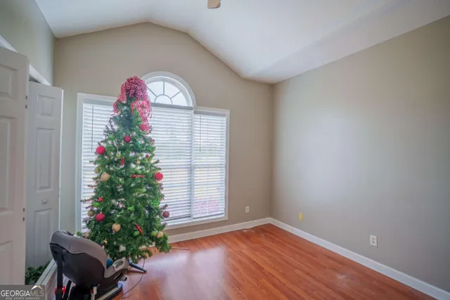 a view of entryway with flower pots