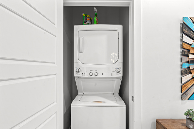 1122 South 1790th Street West, Unit 2 St. George, UT 84770 - Photo 13 of 37 Dedicated laundry closet featuring a white stacked washer and dryer