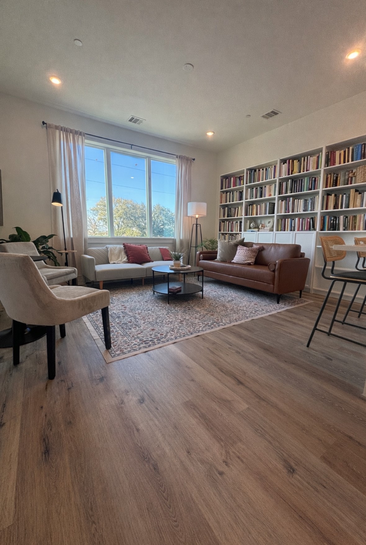 3824 Fulton Street, Unit 112 Houston, TX 77009 - Photo 2 of 15 a living room with furniture and a large window