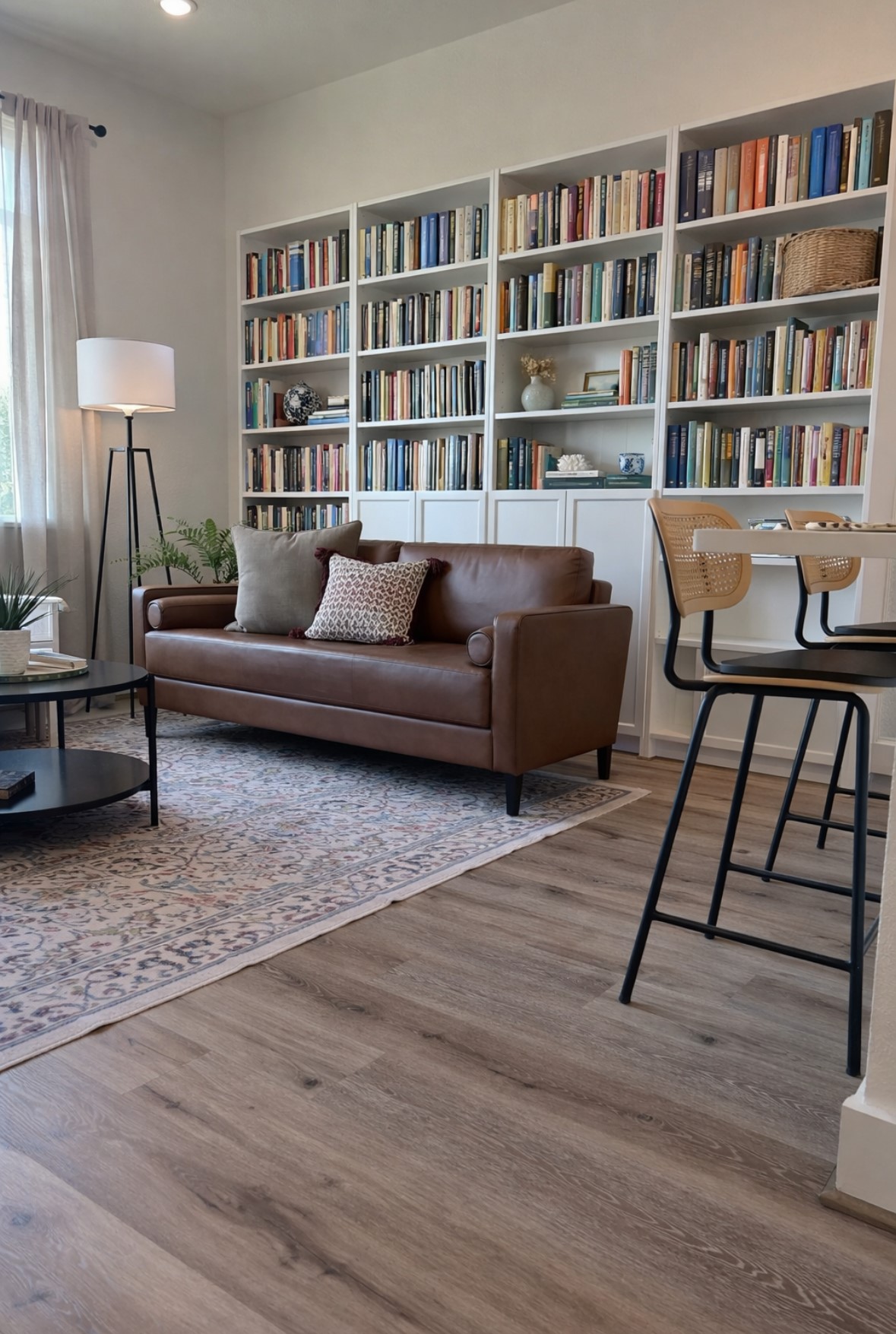 3824 Fulton Street, Unit 112 Houston, TX 77009 - Photo 3 of 15 a living room with furniture and a book shelf