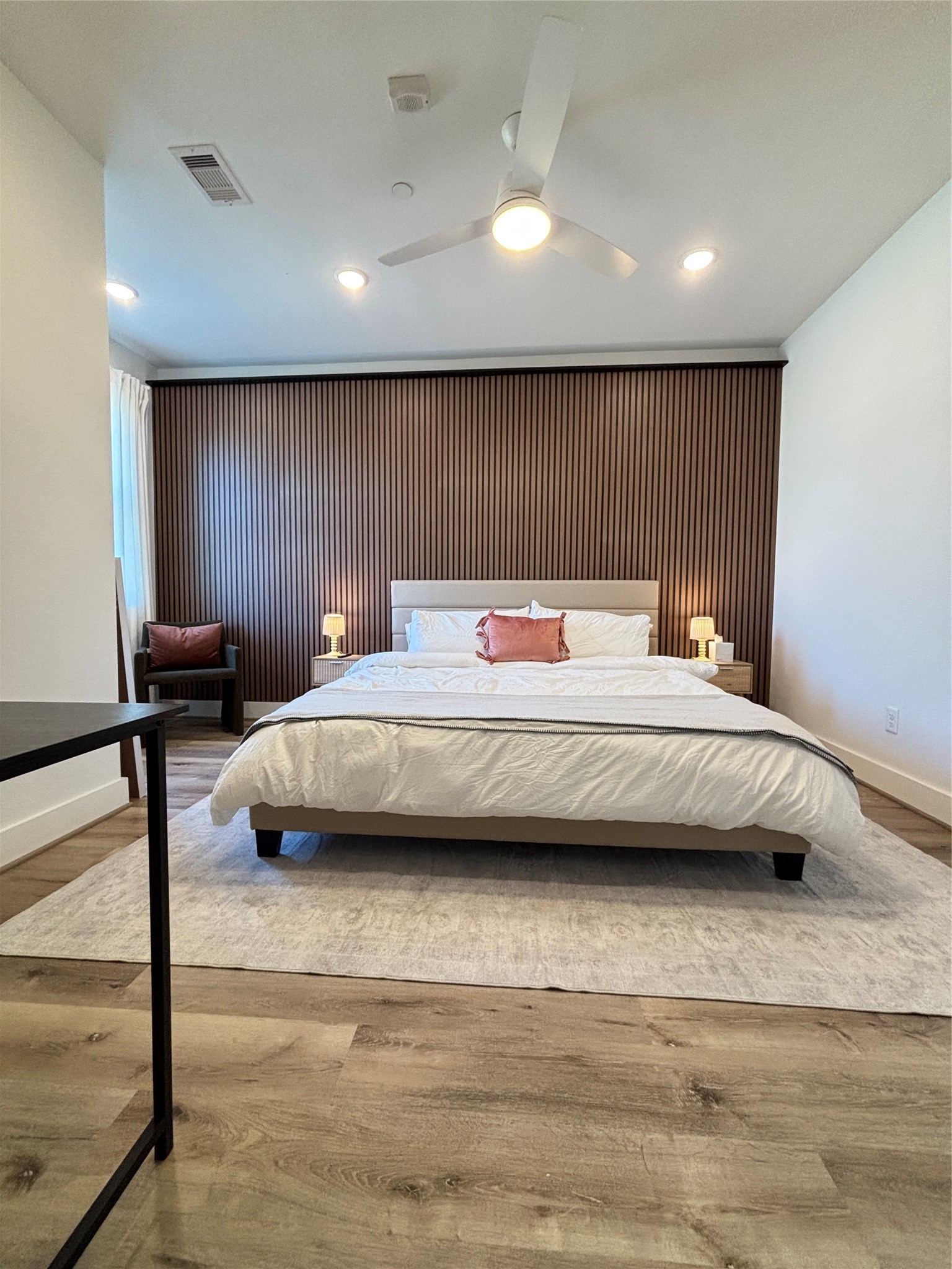 3824 Fulton Street, Unit 112 Houston, TX 77009 - Photo 5 of 15 a bedroom with a bed and a window