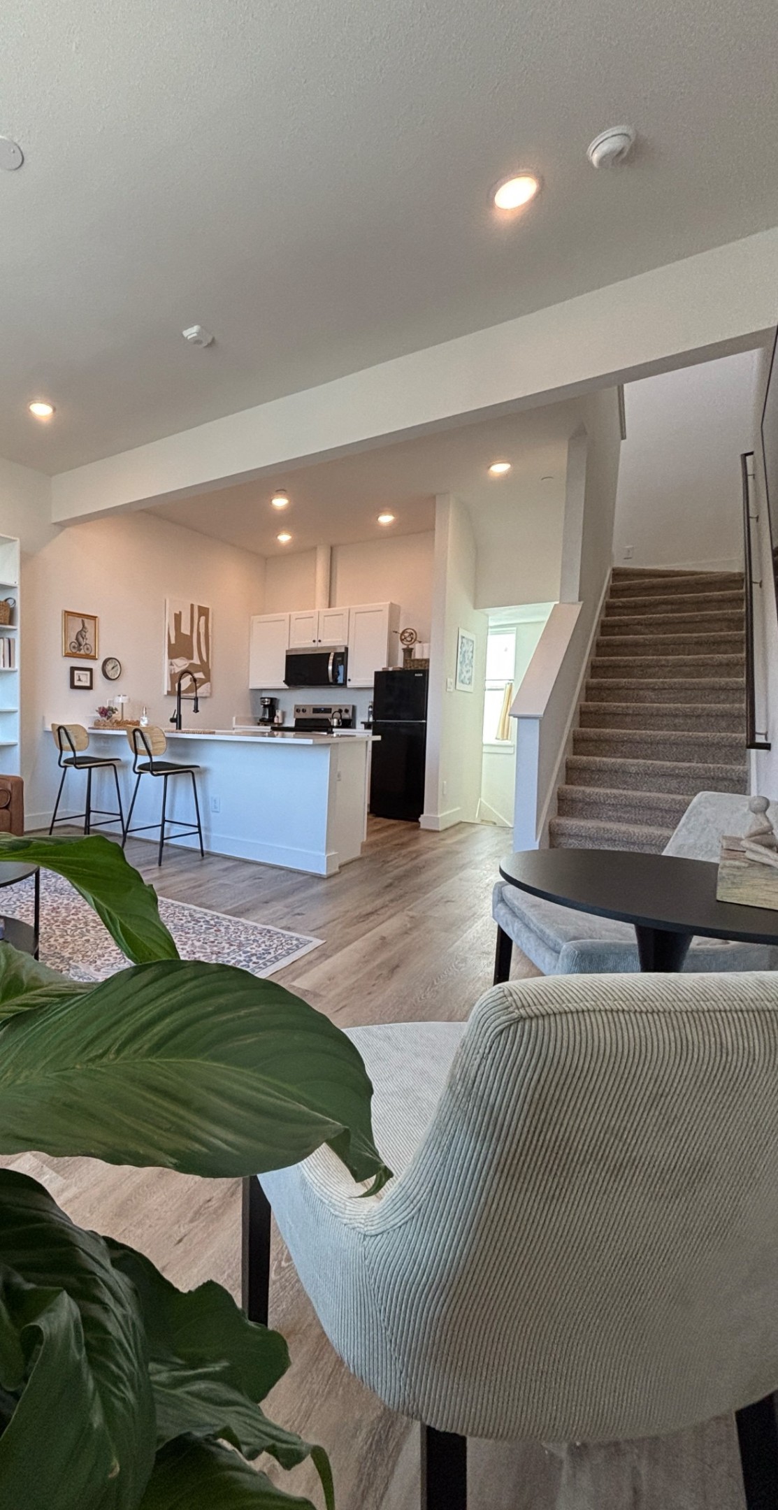 3824 Fulton Street, Unit 112 Houston, TX 77009 - Photo 6 of 15 a living room with lots of furniture and kitchen view