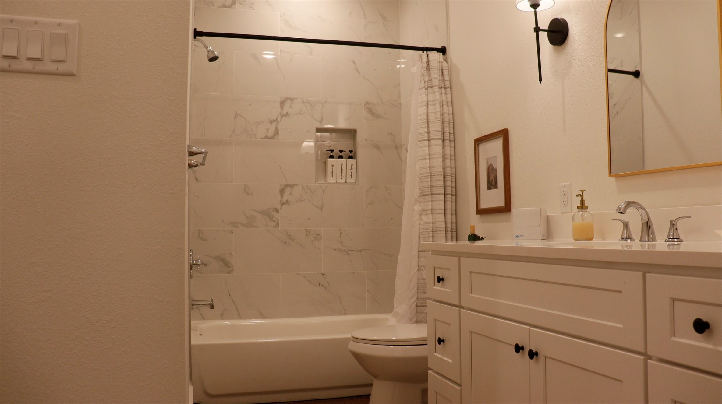 3824 Fulton Street, Unit 112 Houston, TX 77009 - Photo 10 of 15 a bathroom with a granite countertop sink toilet and shower
