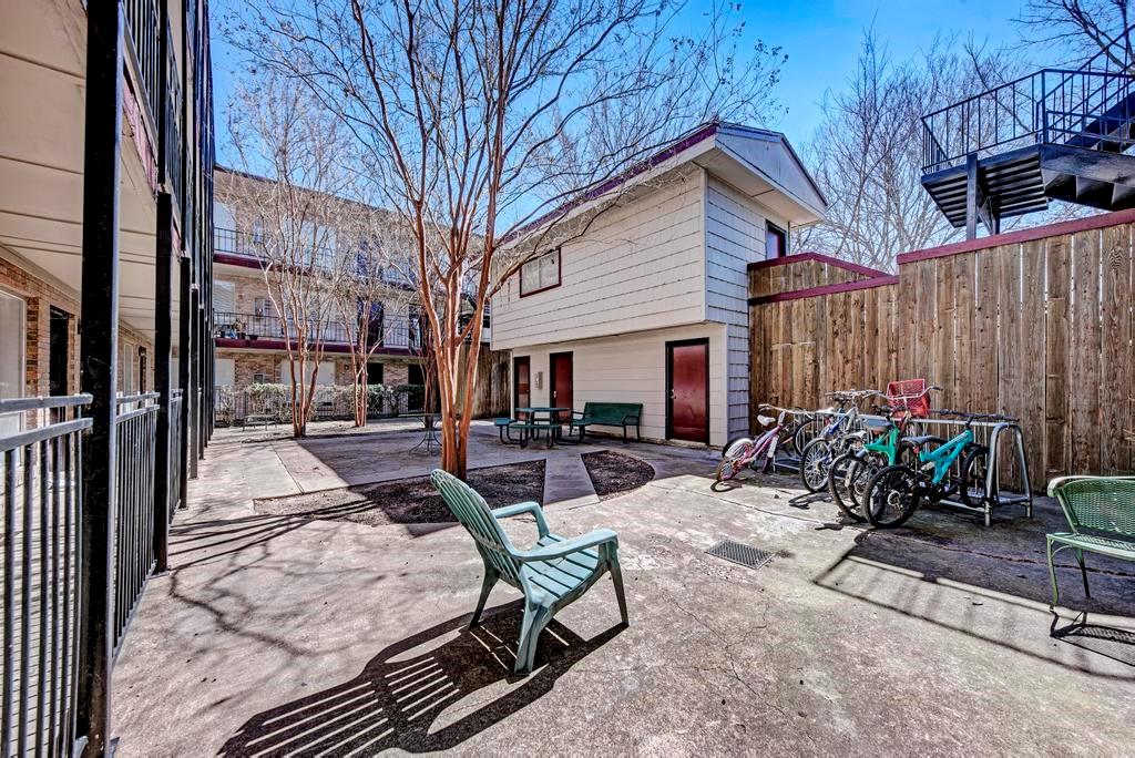 2207 Leon Street, Unit 109A Austin, TX 78705 - Photo 10 of 11 a view of a dinning table and chairs in the patio of the house