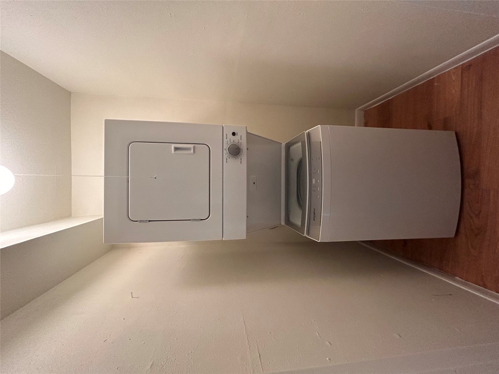 2207 Leon Street, Unit 109A Austin, TX 78705 - Photo 9 of 11 a utility room with dryer and washer