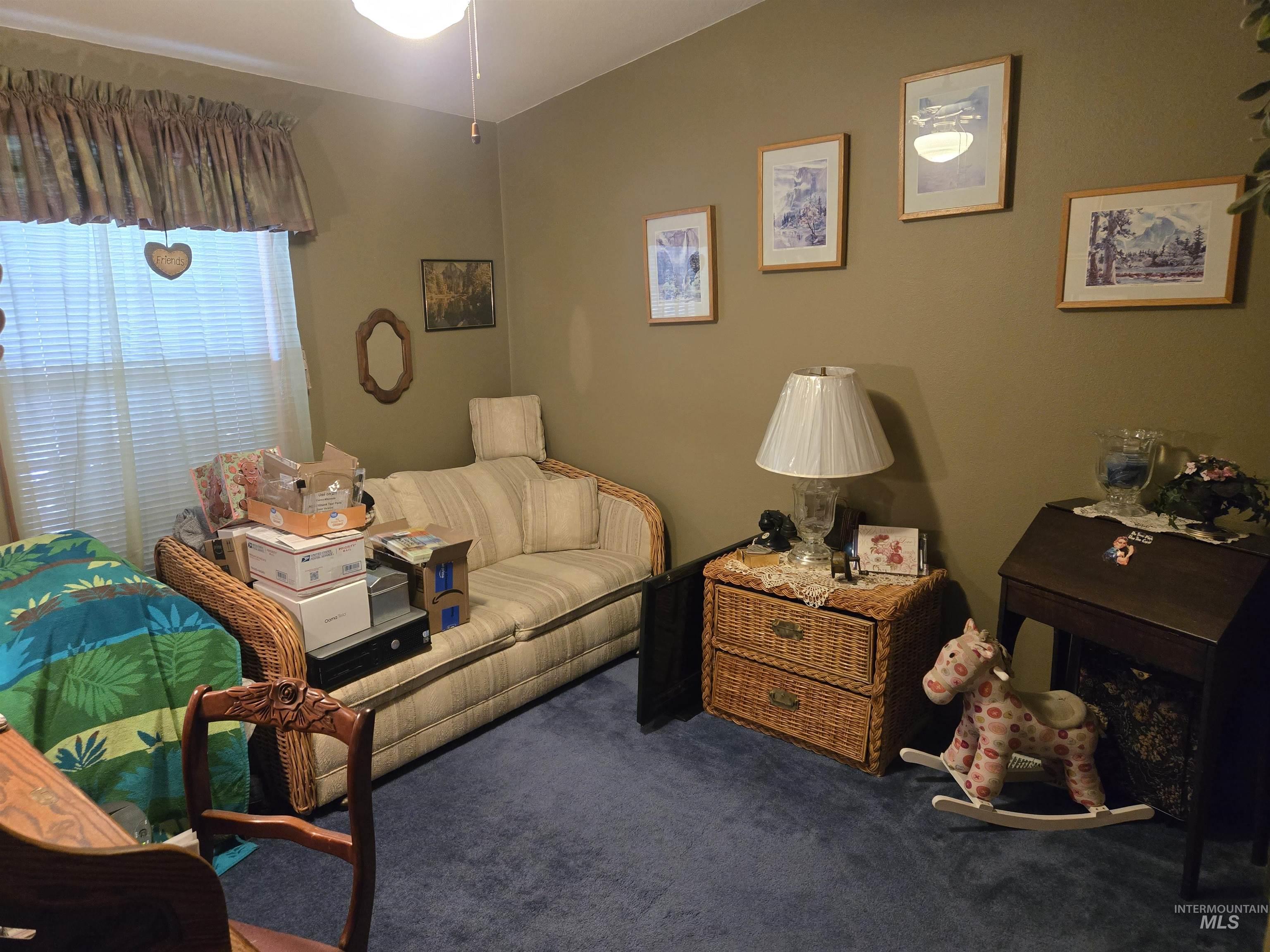 254 Lackey Road Weippe, ID 83553 - Photo 13 of 38 Carpeted bedroom with vaulted ceiling