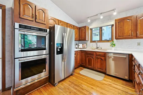 a view of an empty room with windows