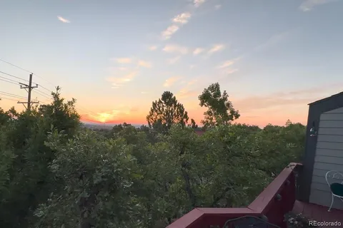 a view of balcony with furniture and stove