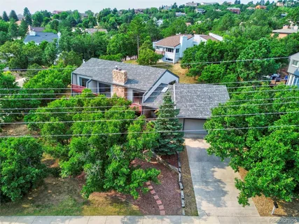 an aerial view of residential house and outdoor space