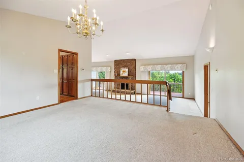 a view of a room with a balcony