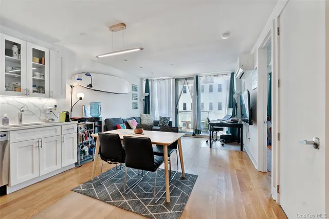 a view of a kitchen and dining room