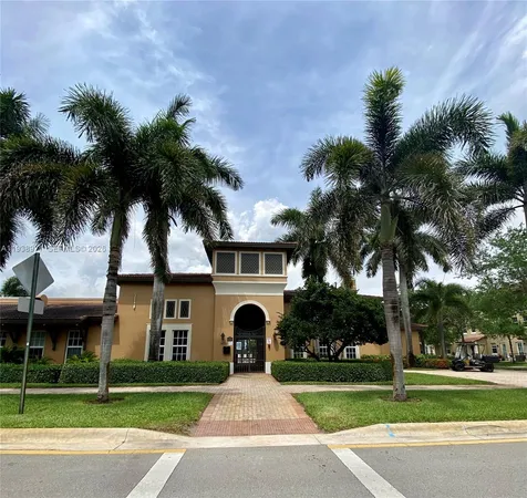 a view of a house with a swimming pool