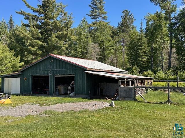 1383 Kelly Trail Isabella, MN 55607 - Photo 26 of 40 View of pole building with a wooded view