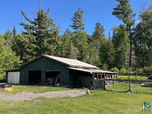 1383 Kelly Trail Isabella, MN 55607 - Photo 27 of 40 View of outdoor structure with a forest view