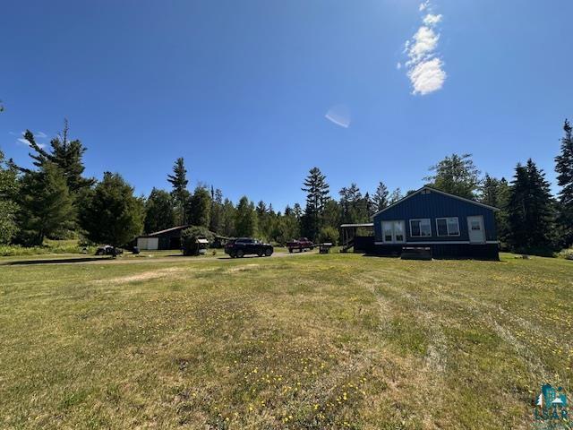 1383 Kelly Trail Isabella, MN 55607 - Photo 31 of 40 View of green lawn