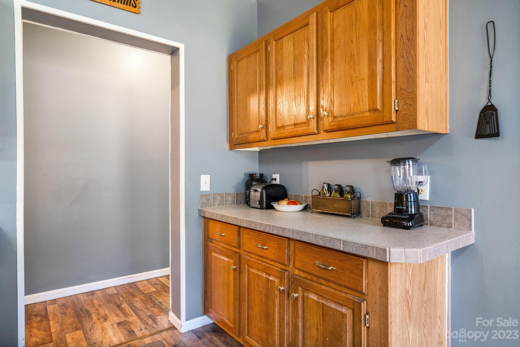 160 Bost Nursery Road Maiden, NC 28650 - Photo 11 of 27 a kitchen with stainless steel appliances granite countertop a refrigerator and a sink