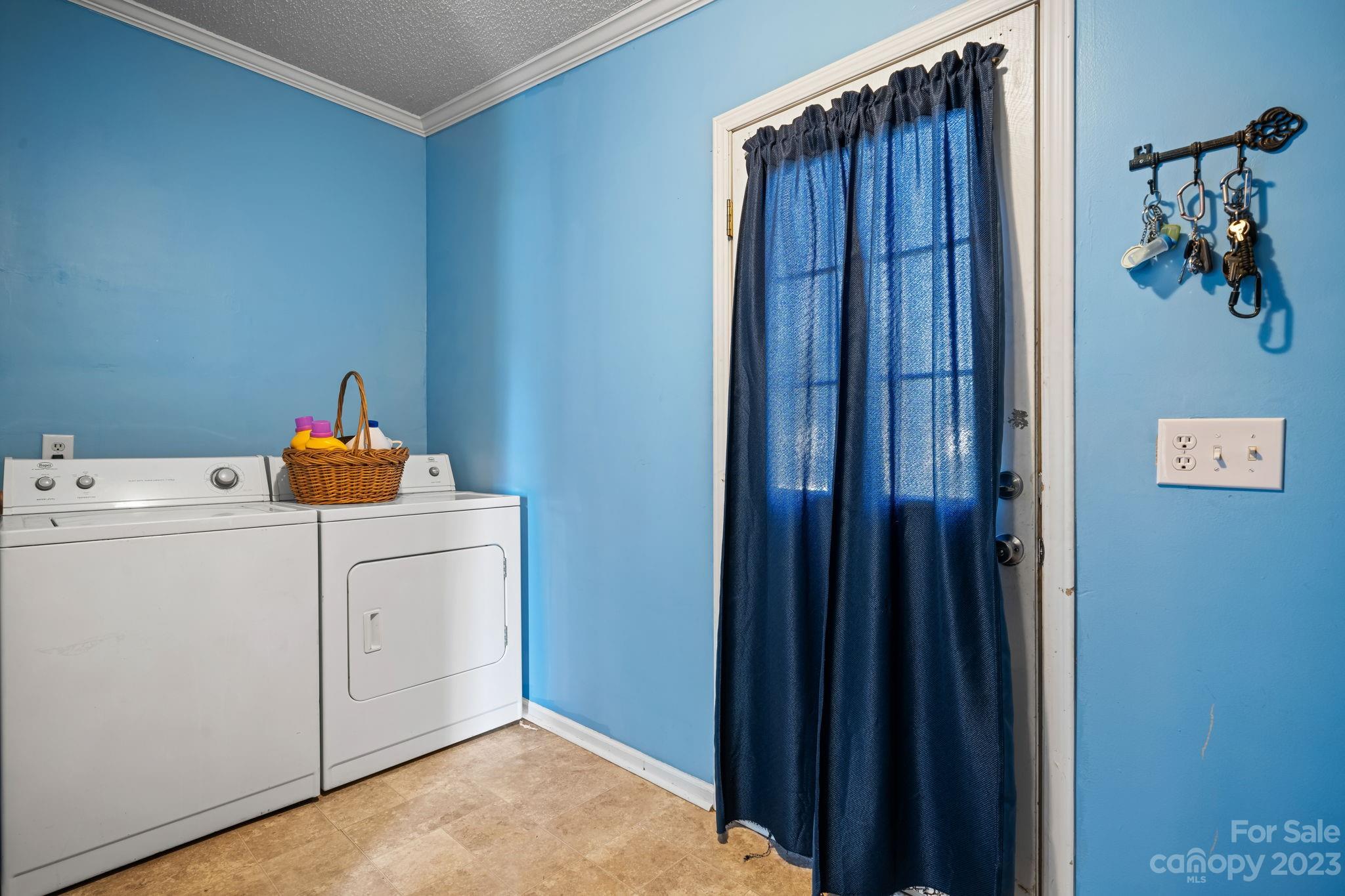 160 Bost Nursery Road Maiden, NC 28650 - Photo 23 of 27 a utility room with dryer and washer