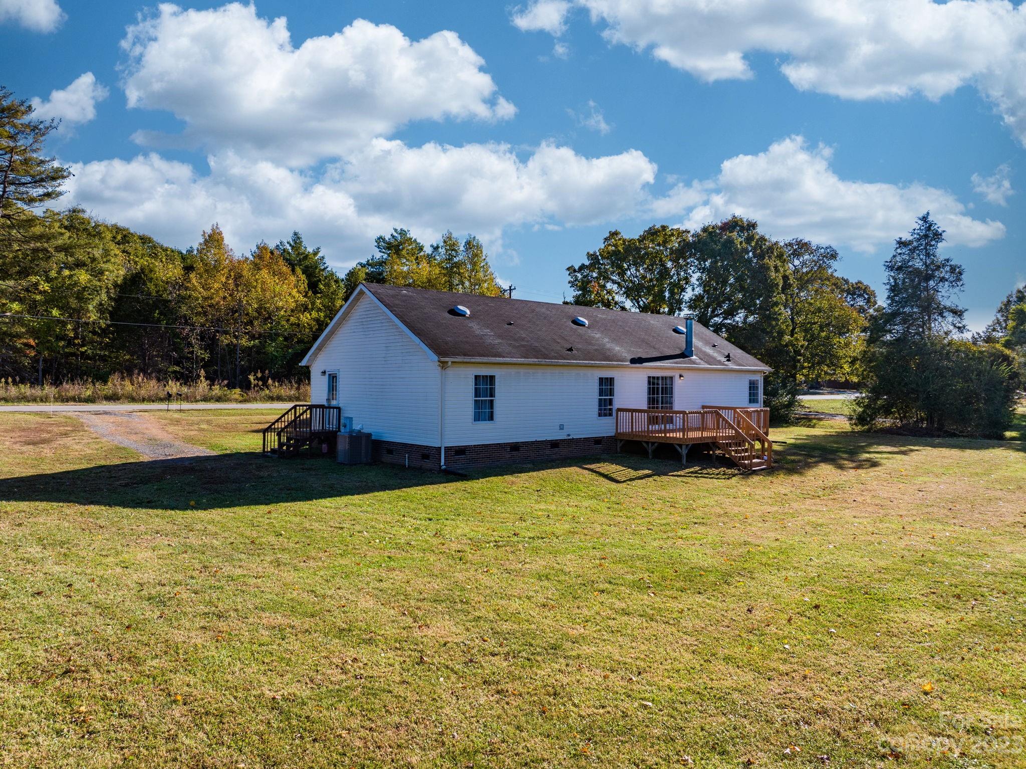 160 Bost Nursery Road Maiden, NC 28650 - Photo 26 of 27 a front view of house with yard and swimming pool