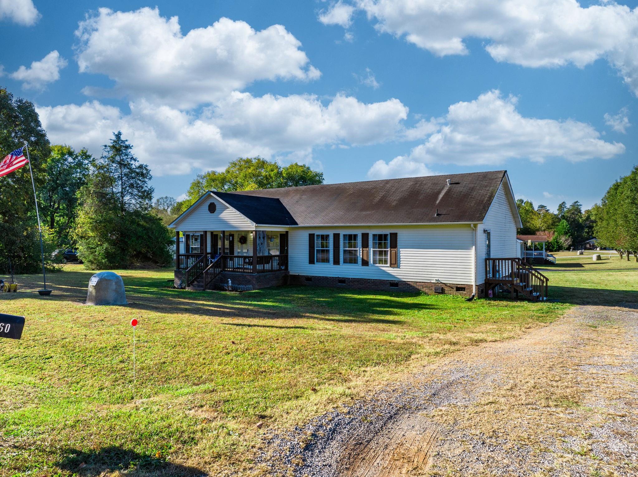 160 Bost Nursery Road Maiden, NC 28650 - Photo 3 of 27 a view of a house with swimming pool and a yard