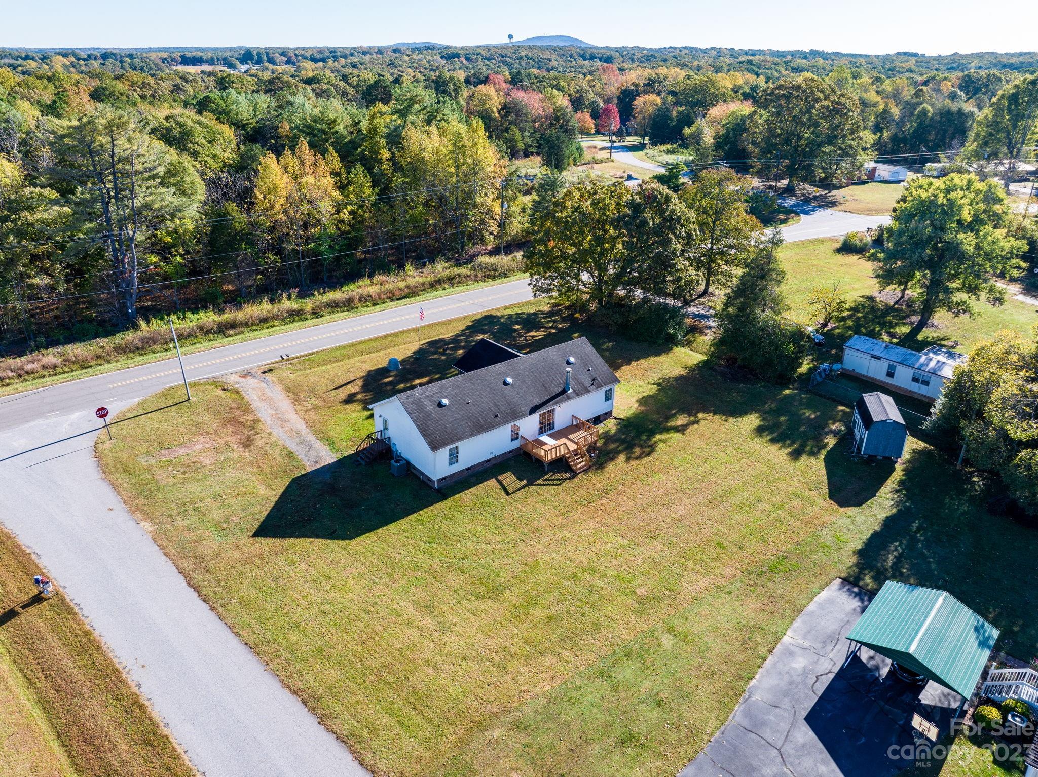 160 Bost Nursery Road Maiden, NC 28650 - Photo 5 of 27 an aerial view of a house with a swimming pool