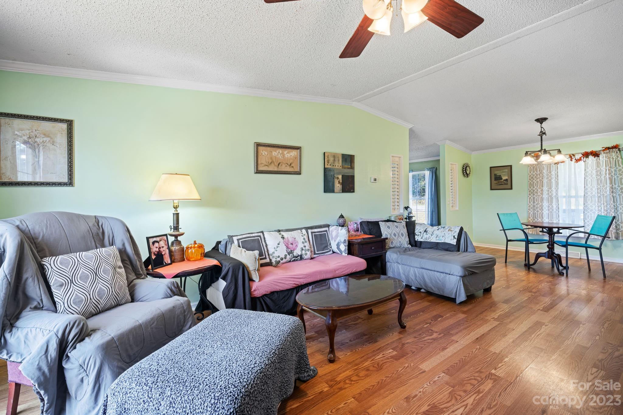 160 Bost Nursery Road Maiden, NC 28650 - Photo 9 of 27 a living room with furniture and wooden floor