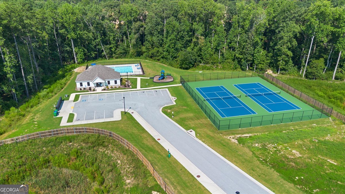 7503 Knoll Hollow Road Lithonia, GA 30058 - Photo 30 of 34 a view of a yard with swimming pool