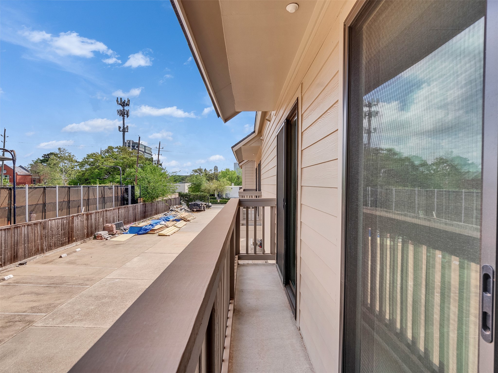 2829 Timmons Lane, Unit 204 Houston, TX 77027 - Photo 17 of 32 a view of a balcony with potted plants