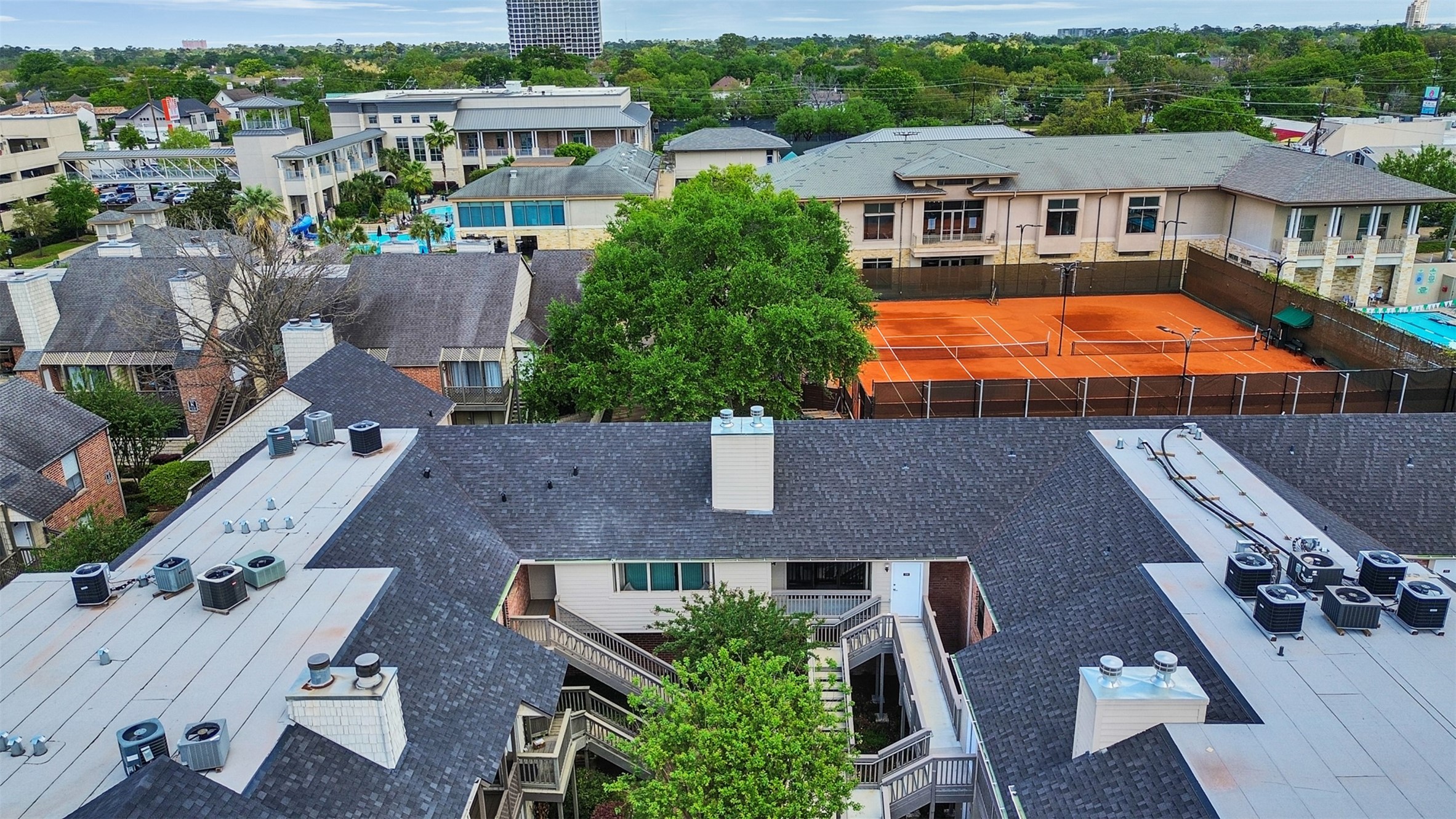 2829 Timmons Lane, Unit 204 Houston, TX 77027 - Photo 29 of 32 an aerial view of a house with a garden