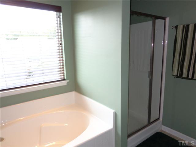 1537 Rodessa Run Raleigh, NC 27607 - Photo 16 of 25 Separate shower and garden tub.