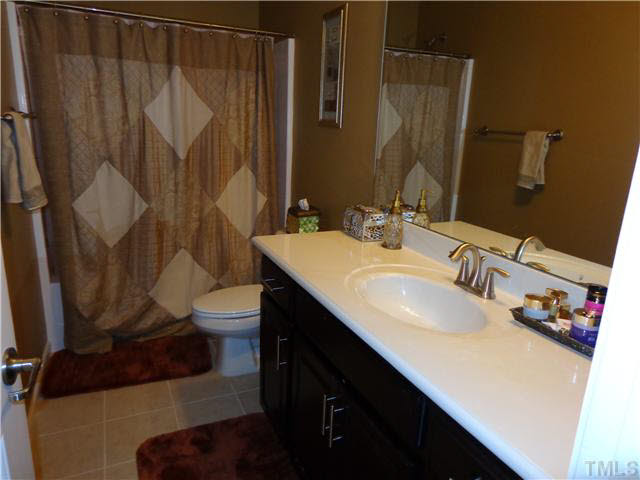 1537 Rodessa Run Raleigh, NC 27607 - Photo 18 of 25 Another full bath upstairs.