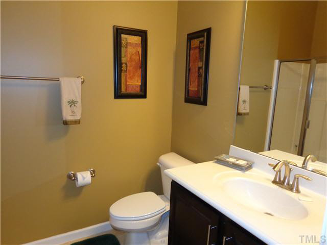 1537 Rodessa Run Raleigh, NC 27607 - Photo 5 of 25 Full bath downstairs with tile floors.