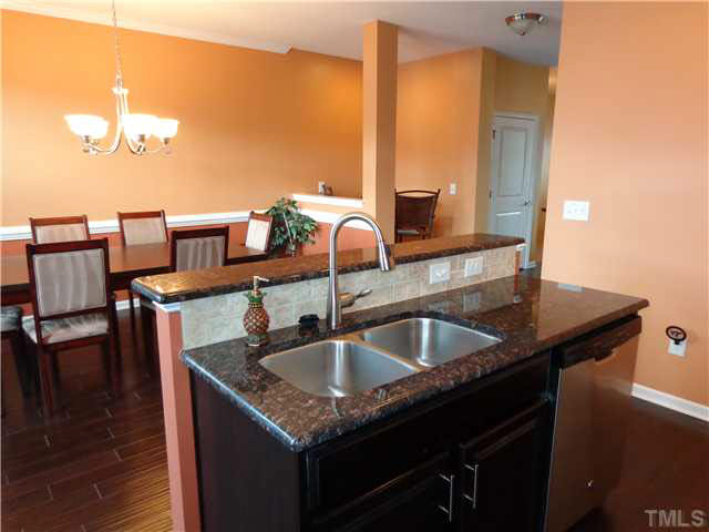 1537 Rodessa Run Raleigh, NC 27607 - Photo 9 of 25 Breakfast bar with room for bar stools.