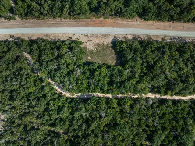 a flag is sitting in the middle of a field