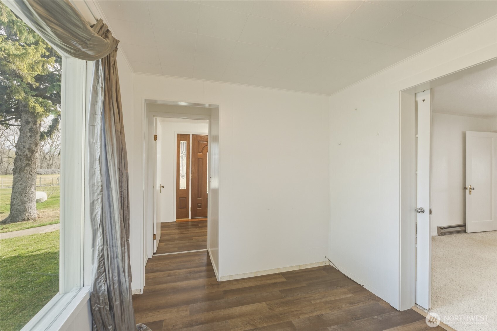 5 Alaska Street Malott, WA 98829 - Photo 19 of 38 a view of a hallway with wooden floor and entryway