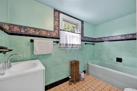 $999,000 | 114 New Hyde Park Road, Garden City, NY 11530