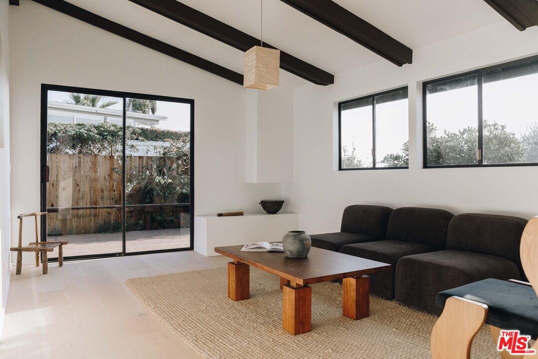 29500 Heathercliff Road, Unit 220 Malibu, CA 90265 - Photo 14 of 43 a living room with furniture