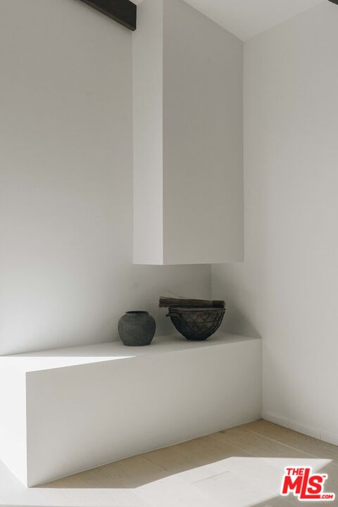 29500 Heathercliff Road, Unit 220 Malibu, CA 90265 - Photo 16 of 43 a kitchen with a cabinets and a potted plant