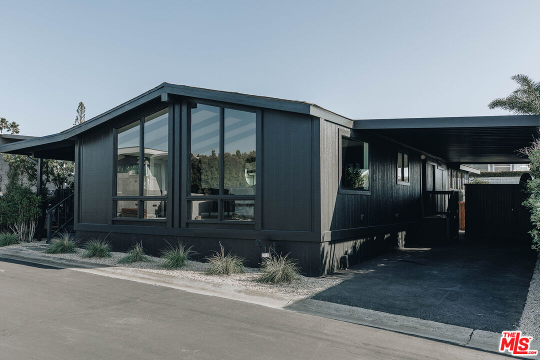 29500 Heathercliff Road, Unit 220 Malibu, CA 90265 - Photo 2 of 43 a front view of a house