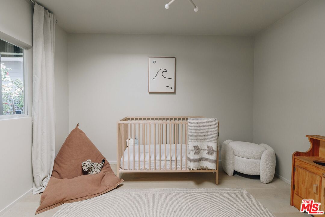 29500 Heathercliff Road, Unit 220 Malibu, CA 90265 - Photo 25 of 43 a bedroom with a couch and a couch