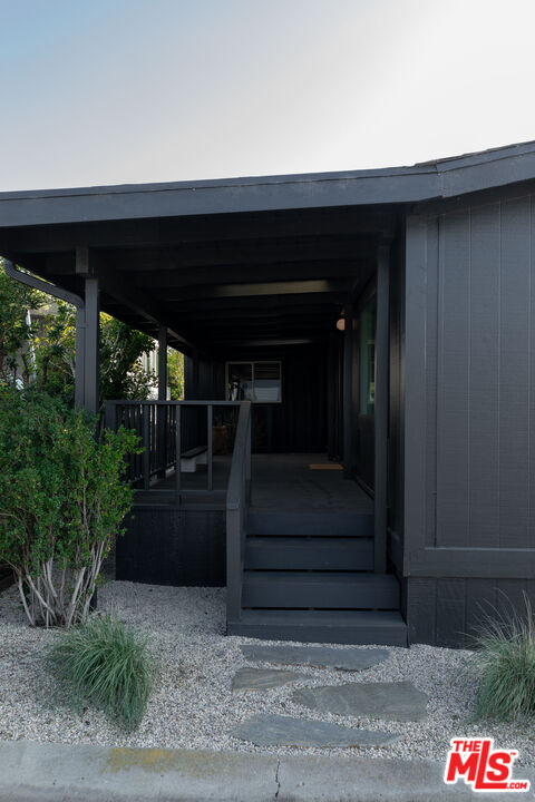 29500 Heathercliff Road, Unit 220 Malibu, CA 90265 - Photo 3 of 43 a room with stairs